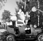 Santa and friend on Antique Car Ride